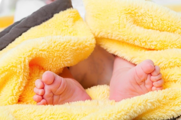 Baby sleeping comfortably with home heating
