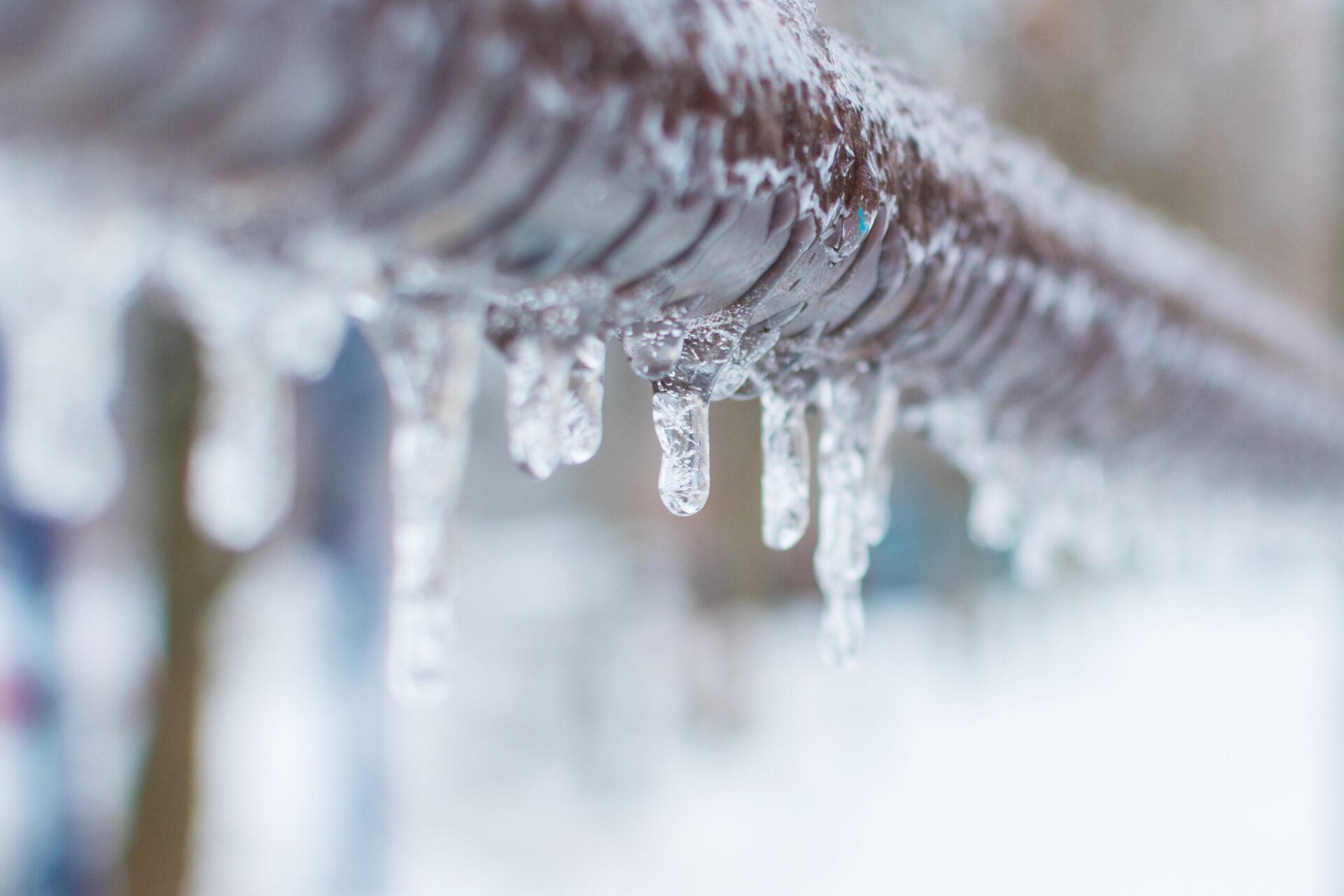 frozen icicles on pipe