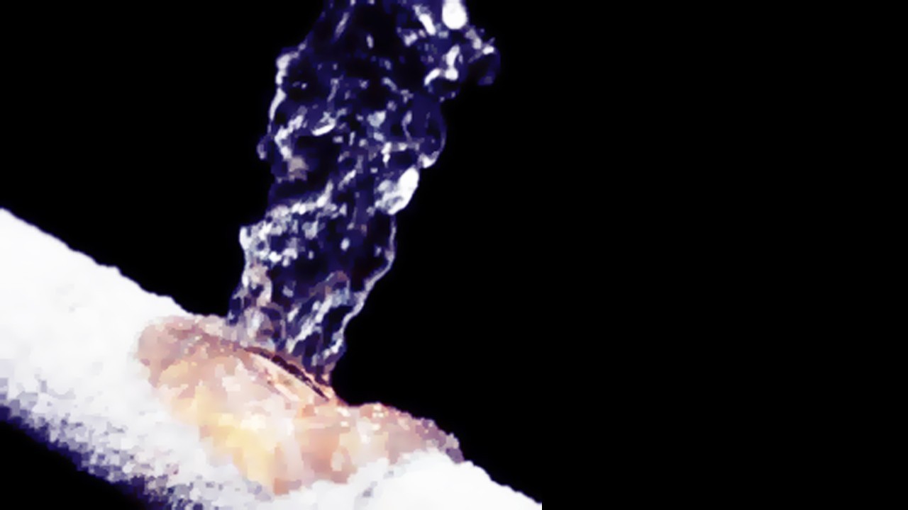 Insulated water pipes in a home basement to prevent freezing during winter