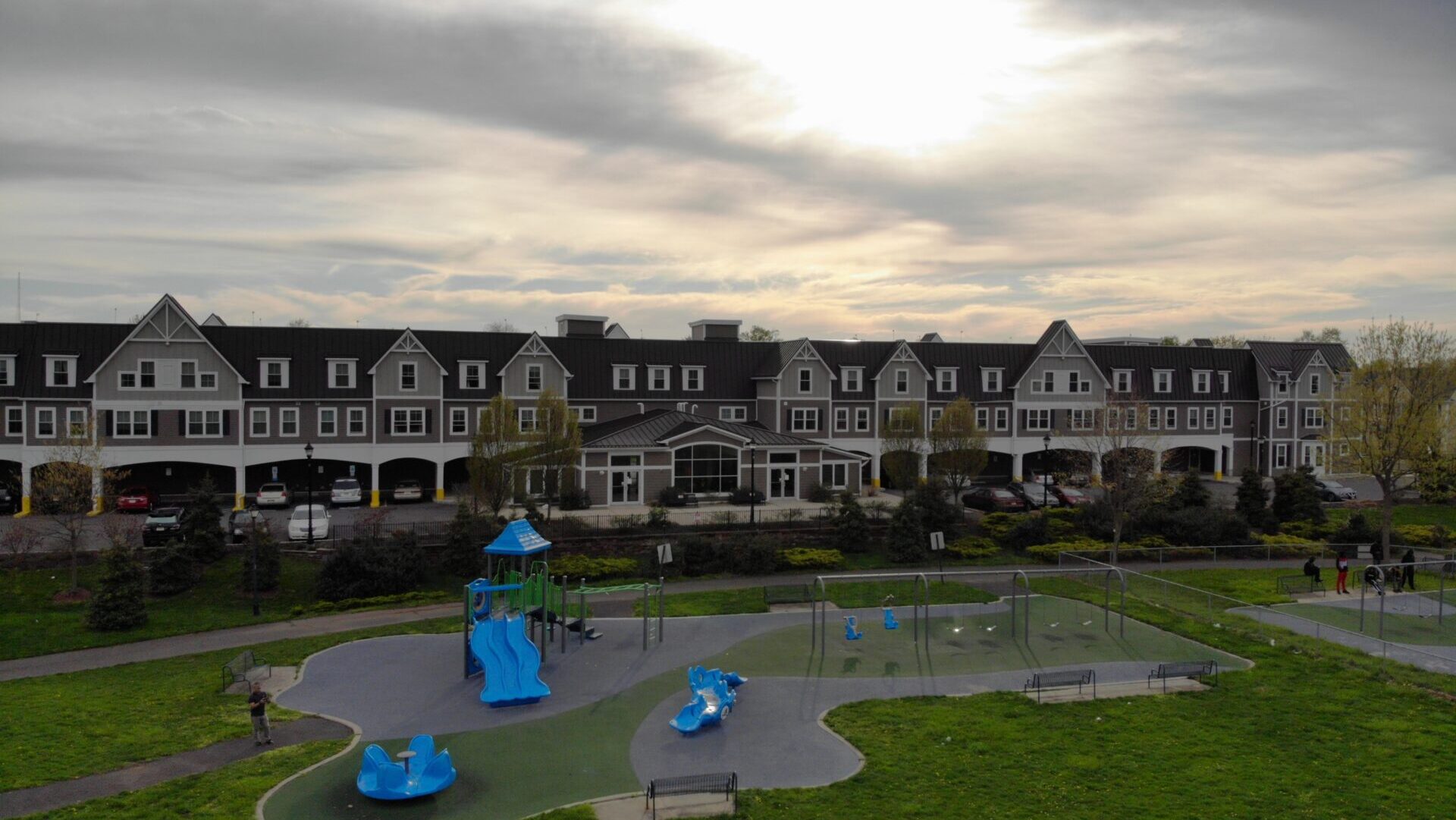 Residential neighborhood with a community playground at sunset in Somerset, New Jersey